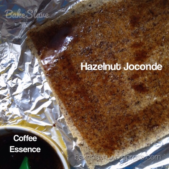 Painstaking job of painting on a thin layer of home-made sticky coffee essence to the first layer of baked joconde